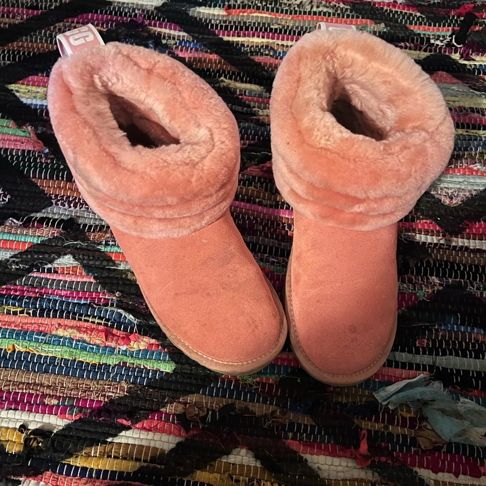 Pink UGG boots, stylish, comes with box and VERY THICK and SOFT.